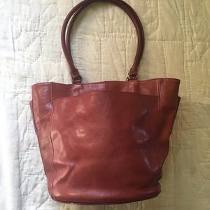 Leather bucket-style bag. Great fall bag. Pockets!